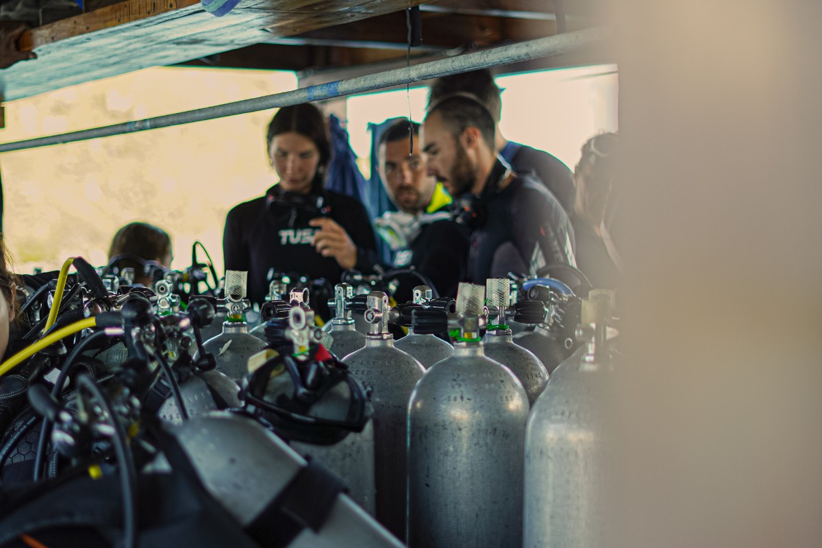 beginner divers preparing on dive boat in Labuan Bajo 