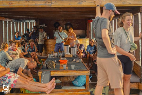 Komodo liveaboard at sunset with reef in background