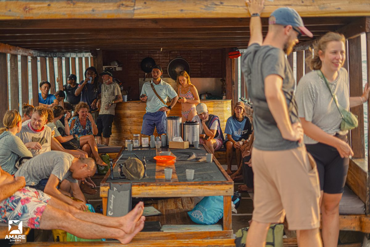 Komodo liveaboard at sunset with reef in background