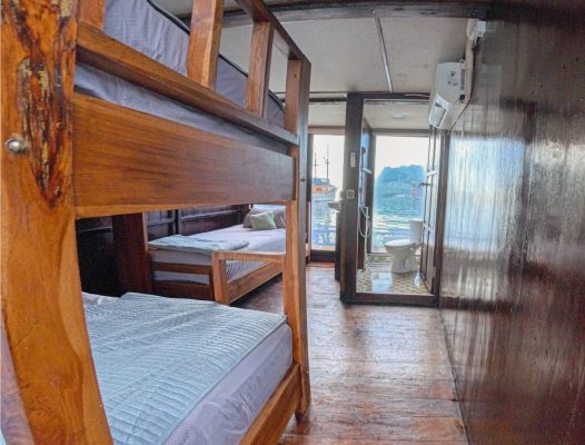 Air-conditioned cabin interior on the Maria Seascape liveaboard, showing where to store your Komodo liveaboard packing list items.